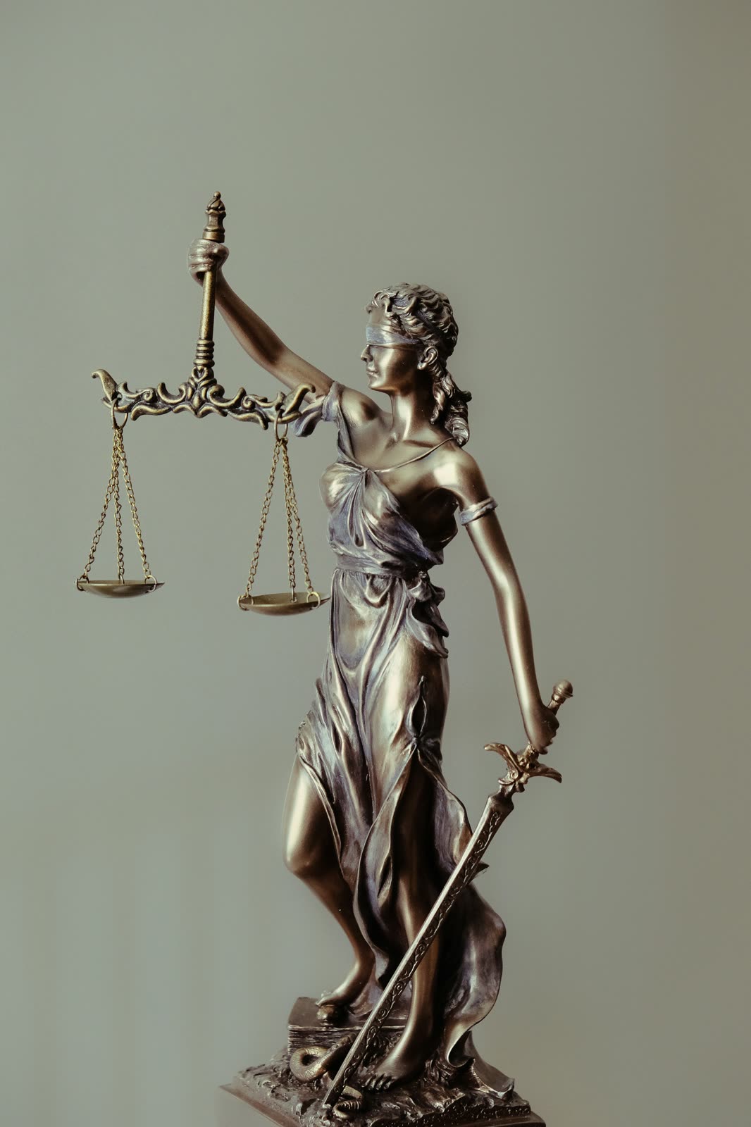 Statue of Lady Justice holding scales
